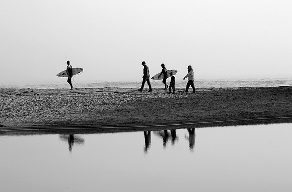 Surfers Walking on the Beach
